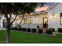 Charming front yard with manicured landscaping, a cozy porch and a welcoming entrance at 3808 E Fairmount Ave, Phoenix, AZ 85018