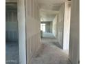 Spacious hallway with high ceilings and ample natural light during construction at 5515 W Piedmont Rd, Laveen, AZ 85339