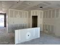 Living room featuring modern design, a utility closet, and open layout during construction at 5515 W Piedmont Rd, Laveen, AZ 85339