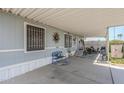 Spacious covered patio featuring comfortable seating and an inviting outdoor living space at 7807 E Main St # H-27, Mesa, AZ 85207