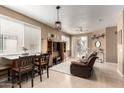 Inviting living area featuring natural light, tile flooring and neutral colors throughout at 1130 E Ferrara St, San Tan Valley, AZ 85140