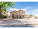 Inviting two-story home with low-maintenance desert landscaping in a desirable neighborhood at 11419 E Ellis St, Mesa, AZ 85207