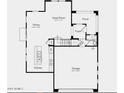 First floor plan highlighting an open concept design with a spacious kitchen, dining area, and great room at 14669 W Sand Hills Rd, Surprise, AZ 85387