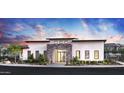 View of the clubhouse front featuring modern architecture, desert landscaping and stone accents at 2121 W Sonoran Desert Dr # 32, Phoenix, AZ 85085