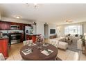Open-concept living space with a kitchen, dining area, and inviting living room at 2922 S Cottonwood Dr, Tempe, AZ 85282