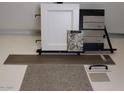 Sample of the home finishes, featuring a cabinet door, flooring, granite, counter, and paint color samples at 3551 W Mary Dr, San Tan Valley, AZ 85144