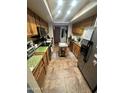 Functional kitchen with essential appliances and ample counter space for food preparation at 14402 N Saguaro Blvd # A, Fountain Hills, AZ 85268