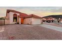 A well maintained single-Gathering home with a red tile roof and a low maintenance front yard at 14418 S 42Nd St, Phoenix, AZ 85044