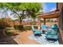 Inviting backyard patio with comfortable seating, perfect for outdoor relaxation at 300 W Cardinal Way, Chandler, AZ 85286