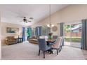 Open living room with vaulted ceilings and views of the backyard, great for entertaining at 300 W Cardinal Way, Chandler, AZ 85286