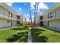 Lush courtyard provides a tranquil oasis between units and offers serene views at 4610 N 68Th St # 411, Scottsdale, AZ 85251