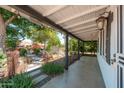 Spacious covered patio with views of the garden, perfect for outdoor relaxing at 4629 N 9Th St, Phoenix, AZ 85014
