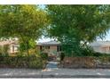 Inviting single-Gathering home with mature trees and a quaint walkway to the front door at 4629 N 9Th St, Phoenix, AZ 85014