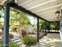 Enjoy the outdoor space with a covered patio, stone pavers, and lush landscaping at 4629 N 9Th St, Phoenix, AZ 85014