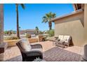 Cozy patio with comfortable wicker seating and a peaceful outdoor ambiance at 6131 S Bradshaw Way, Chandler, AZ 85249