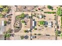 Overhead aerial view featuring a home with a circular driveway and desert landscaping at 833 N 110Th St, Mesa, AZ 85207