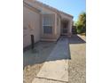 Covered front entryway with desert landscaping providing a charming welcome at 14602 S 47Th St, Phoenix, AZ 85044