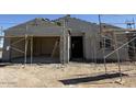 Unfinished exterior showing the stucco application to a single-story home at 9531 W Parkway Dr, Tolleson, AZ 85353