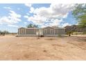 Single story home featuring neutral paint, contrasting trim and easy to navigate steps at 11912 N Thunderbird Rd, Maricopa, AZ 85139