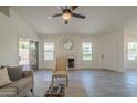 Bright living room with fireplace and neutral tones at 4248 E Jason Dr, Phoenix, AZ 85050