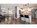 Modern kitchen boasts stainless steel appliances and granite countertops at 4136 E Eugie Ave, Phoenix, AZ 85032