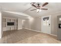 Inviting living room with wood floors and ample natural light, perfect for relaxation and entertaining at 8103 E Southern #303 Ave, Mesa, AZ 85209