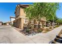 Home exterior featuring low-maintenance landscaping, sidewalk, and a well-maintained lawn at 1528 N Balboa --, Mesa, AZ 85205