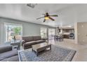 Open living space showcasing tile floors, an area rug, and a ceiling fan at 17425 N 1St Dr, Phoenix, AZ 85023