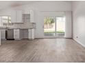 Bright open-concept kitchen with stainless steel appliances and granite countertops at 22039 N 35Th Dr, Glendale, AZ 85310