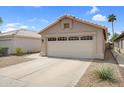 Charming single-story home with a two-car garage and low-maintenance desert landscaping at 4615 W Del Rio St, Chandler, AZ 85226