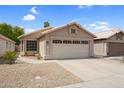 Charming single-story home with a two-car garage and low-maintenance desert landscaping at 4615 W Del Rio St, Chandler, AZ 85226