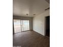 Bright living room with sliding glass doors leading to the backyard at 11802 N 25Th Ave, Phoenix, AZ 85029