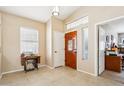 Inviting home foyer featuring tile flooring, natural light, and neutral paint, offering a welcoming entrance at 11861 E Becker Ln, Scottsdale, AZ 85259