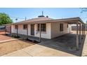 Charming single-story home featuring covered parking at 2721 W Luke Ave, Phoenix, AZ 85017