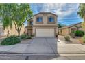 Charming two-story home with a two car garage, desert landscaping, and a cozy front porch at 3049 W Santa Cruz Ave, San Tan Valley, AZ 85144