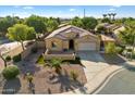 Inviting aerial view of a single story home showcasing desert landscaping and a neatly manicured yard at 4032 S Santa Rita Pl, Chandler, AZ 85249