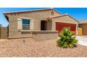 Charming single-story home featuring a covered porch and a neutral stucco facade at 5626 W Rainwater Dr, Laveen, AZ 85339