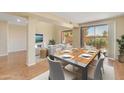Bright dining room featuring sliding glass doors to an outdoor space and an open concept layout at 705 W Queen Creek Rd # 1201, Chandler, AZ 85248
