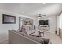 Modern living room featuring wood-look floors, stylish furniture, and an open layout at 1235 E Dover St, Mesa, AZ 85203