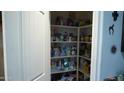 Well-stocked walk-in pantry with ample shelving at 1309 W Park St, Phoenix, AZ 85041