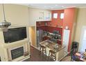 Open concept kitchen with island, stainless steel appliances, and adjacent breakfast nook at 15221 N Clubgate Dr # 2044, Scottsdale, AZ 85254