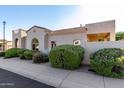This single-Gathering home has mature landscaping, desert rock and a stucco exterior at 16846 N 49Th Way, Scottsdale, AZ 85254