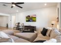 Living area featuring plush seating and media center at 17140 W Running Deer Trl, Surprise, AZ 85387