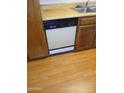 Kitchen featuring wood cabinets, stainless steel sink and appliances at 3807 W Mitchell Dr, Phoenix, AZ 85019