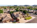 Charming home with well-manicured front lawn, 2-car garage, surrounded by a serene neighborhood at 4215 W Hackamore Dr, Phoenix, AZ 85083