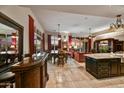 Expansive living area featuring dining, kitchen, and seating spaces bathed in natural light and designer touches at 8139 E Club Village Dr, Gold Canyon, AZ 85118