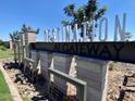 Neighborhood monument sign at 'Destination at Gateway' featuring manicured landscaping at 11417 E Utah Ave, Mesa, AZ 85212