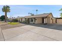Beautiful single story home with well-kept yard and long driveway at 2525 E Nisbet Rd, Phoenix, AZ 85032