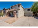 Charming two-story home featuring an attached garage and spacious driveway at 4010 W Fremont Rd, Phoenix, AZ 85041
