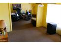 Spacious living room with large window and neutral decor at 4550 W Cinnabar Ave, Glendale, AZ 85302